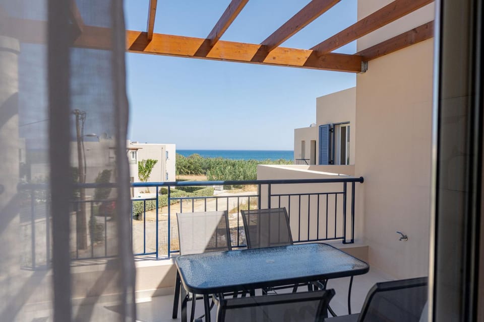 Property building, Patio, Day, Natural landscape, View (from property/room), Balcony/Terrace, Dining area, Sea view