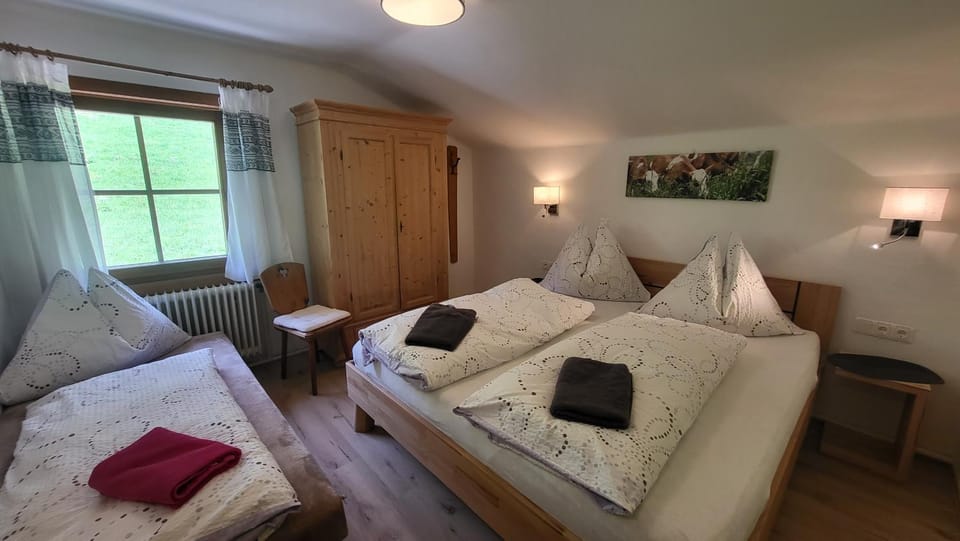 Bed, Photo of the whole room, towels, wardrobe