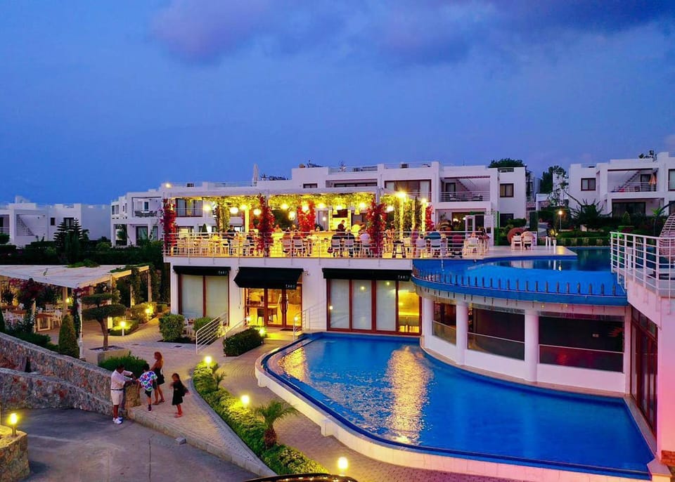 Property building, Restaurant/places to eat, Evening entertainment, Evening entertainment, Swimming pool