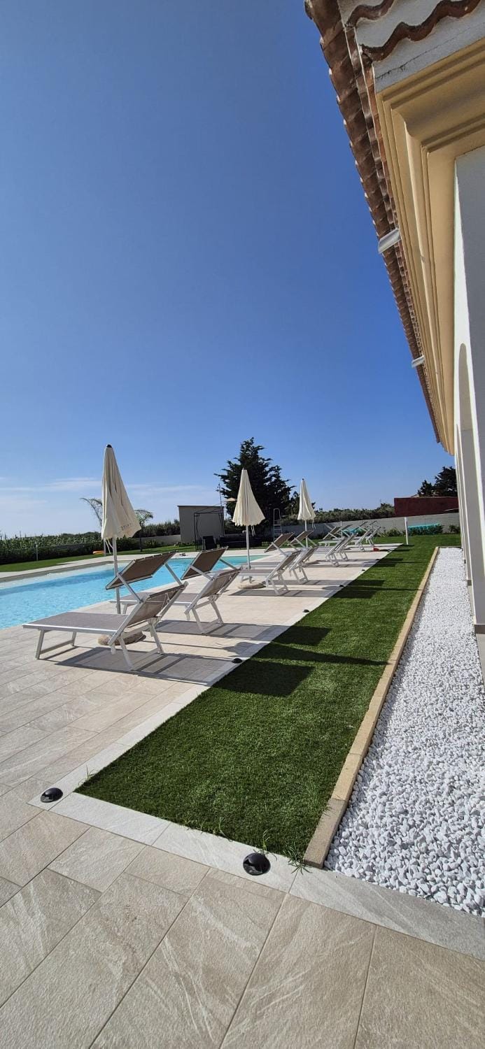 Property building, Patio, Day, Natural landscape, Balcony/Terrace, Pool view, Swimming pool, sunbed
