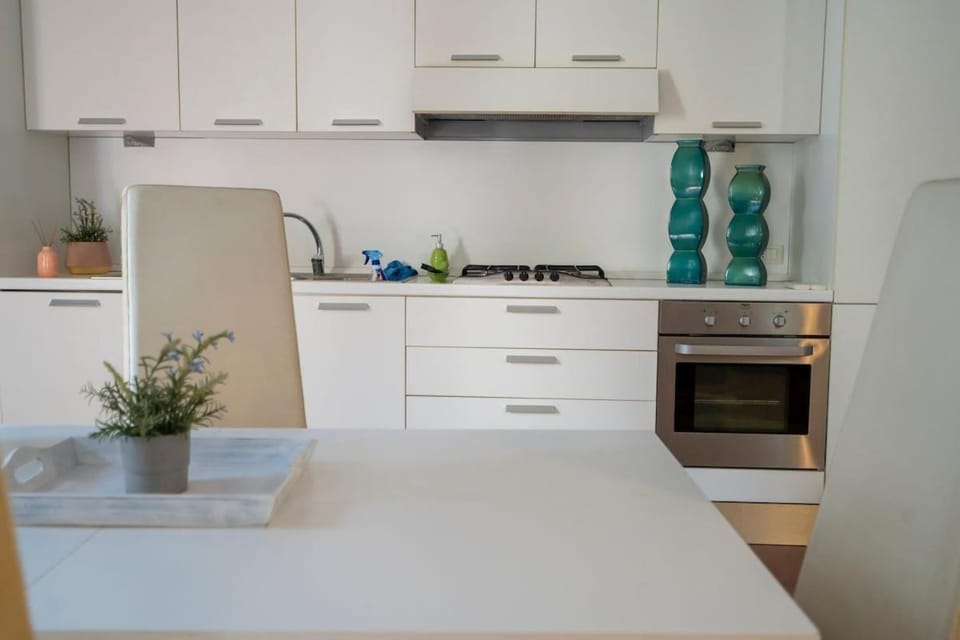 Kitchen or kitchenette, oven, stove