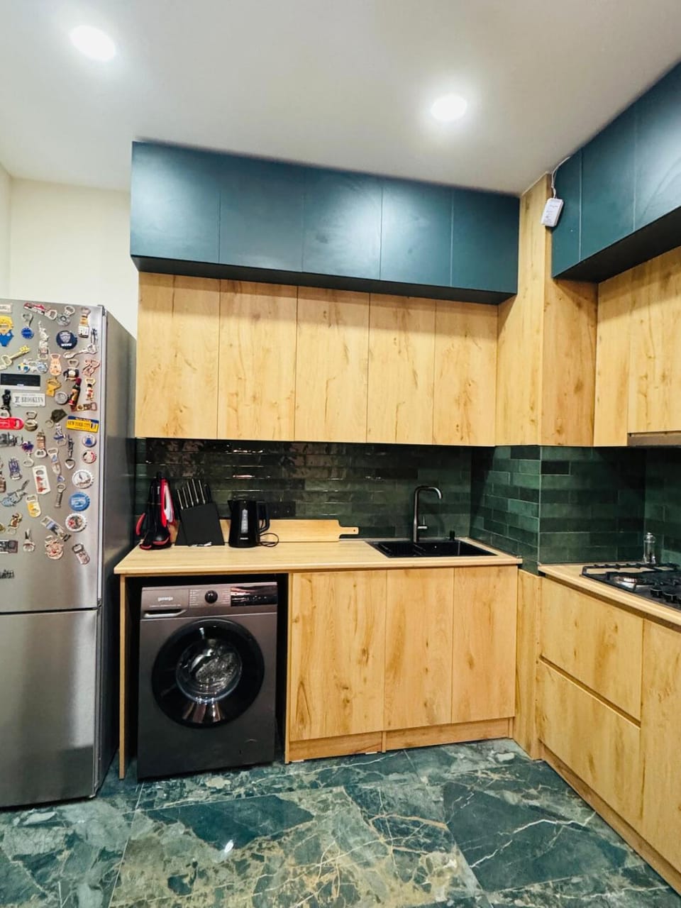 Kitchen or kitchenette, oven, stove, washing machine
