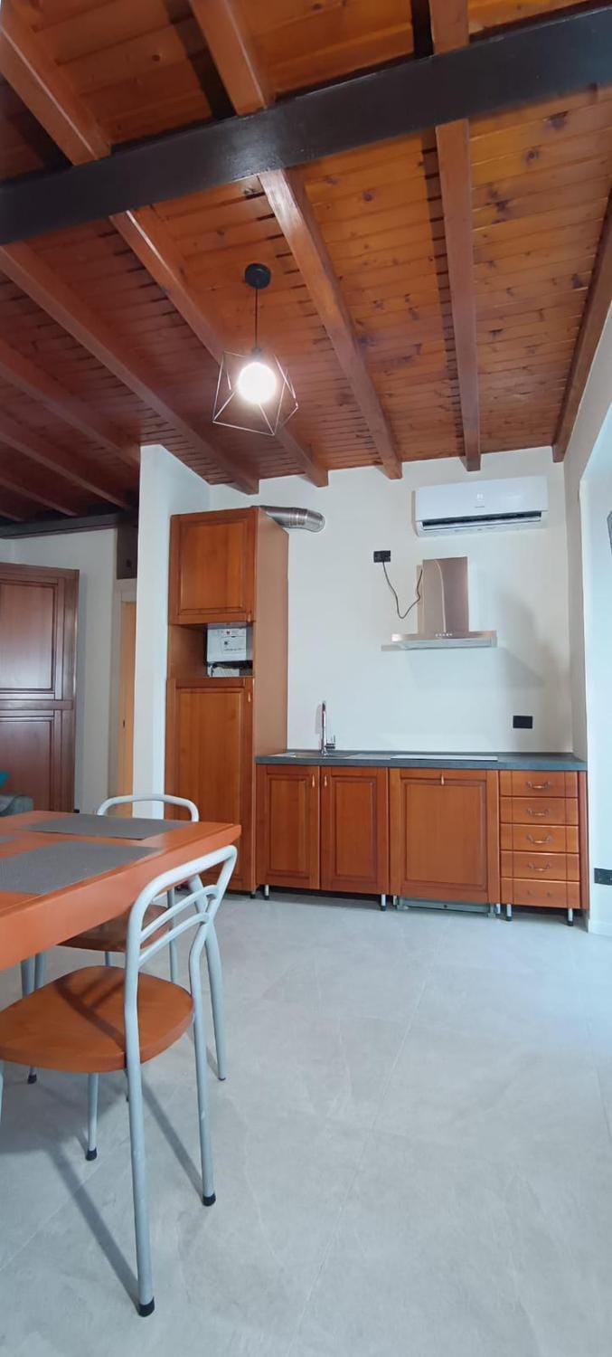 Kitchen or kitchenette, Seating area, Dining area, stove, air conditioner