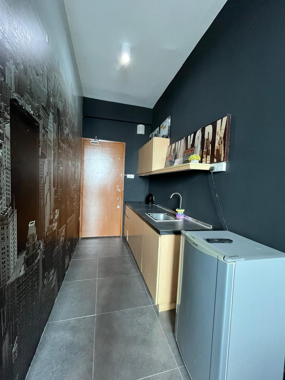Kitchen or kitchenette, dishwasher, oven, stove