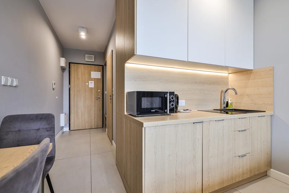 Kitchen or kitchenette, oven, stove