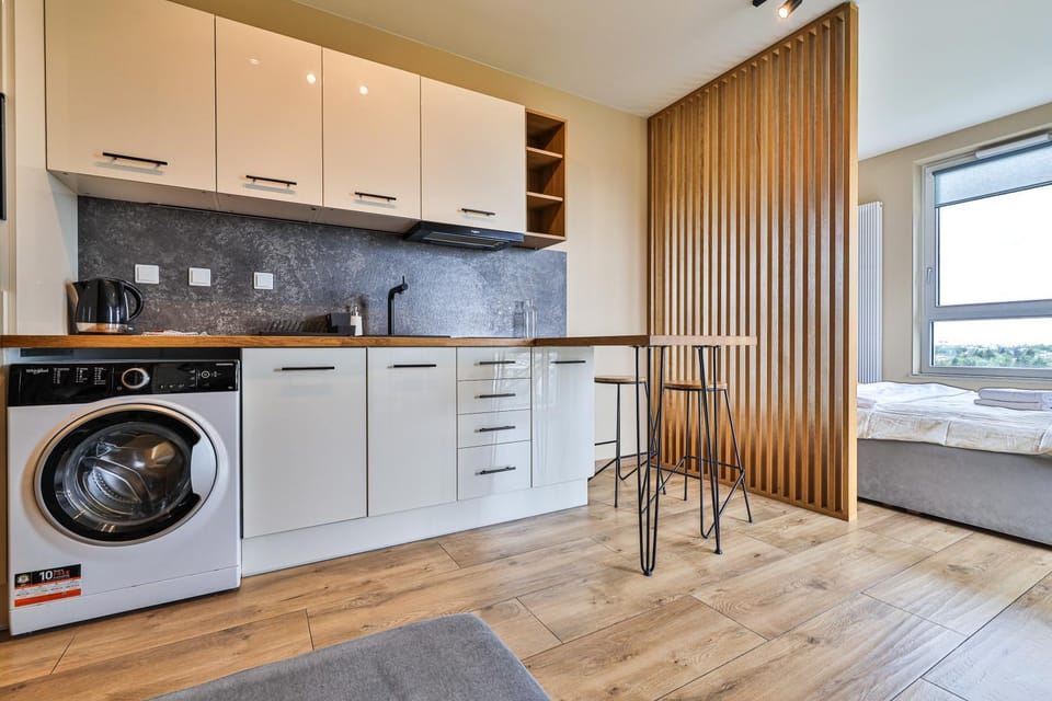 Kitchen or kitchenette, washing machine