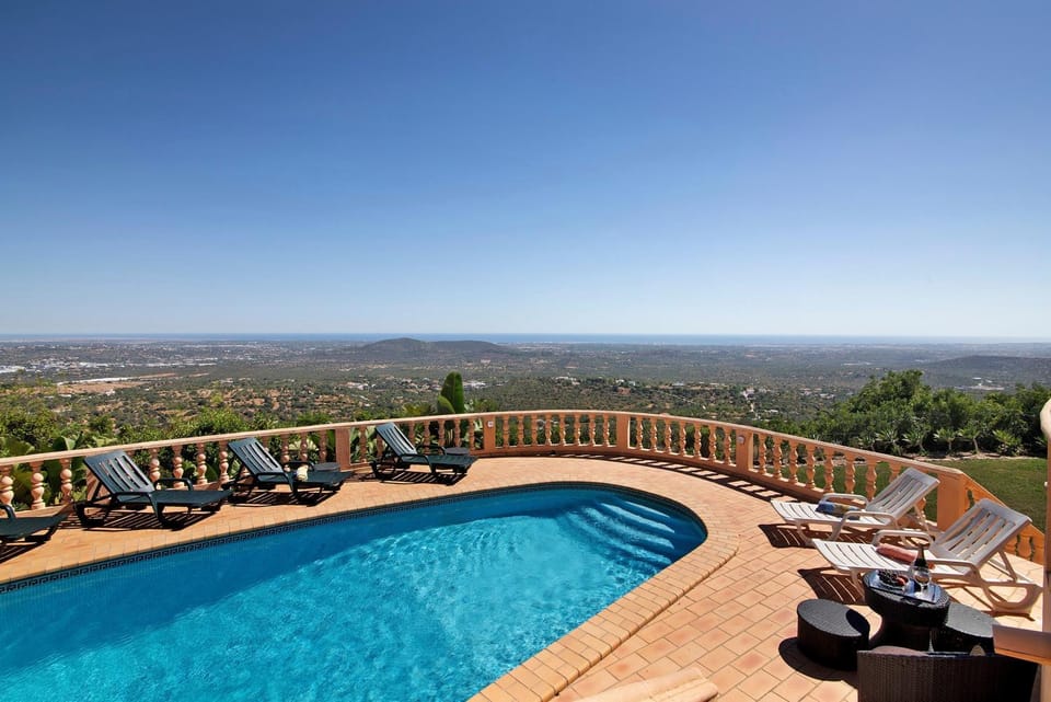 Property building, Living room, Swimming pool