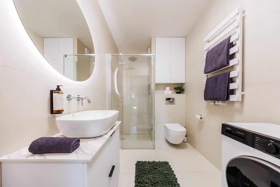 Shower, Toilet, Bathroom, towels, washing machine, dryer