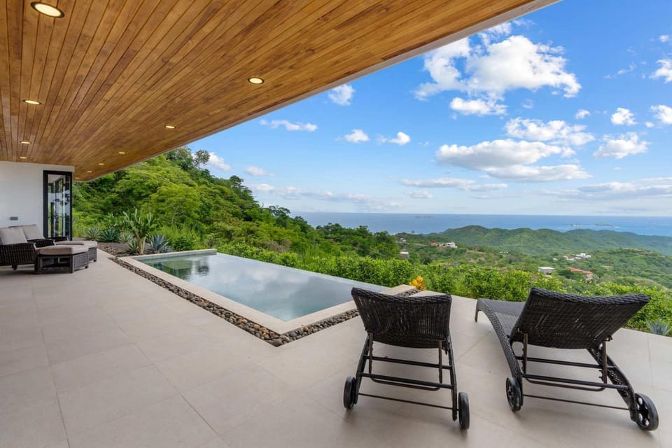 Mountainside Home with Modern Design Sweeping Ocean Views & Private Swimming Pool House in Guanacaste Province