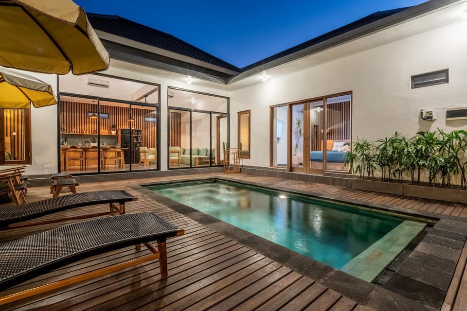 Patio, Night, Pool view, Swimming pool, sunbed