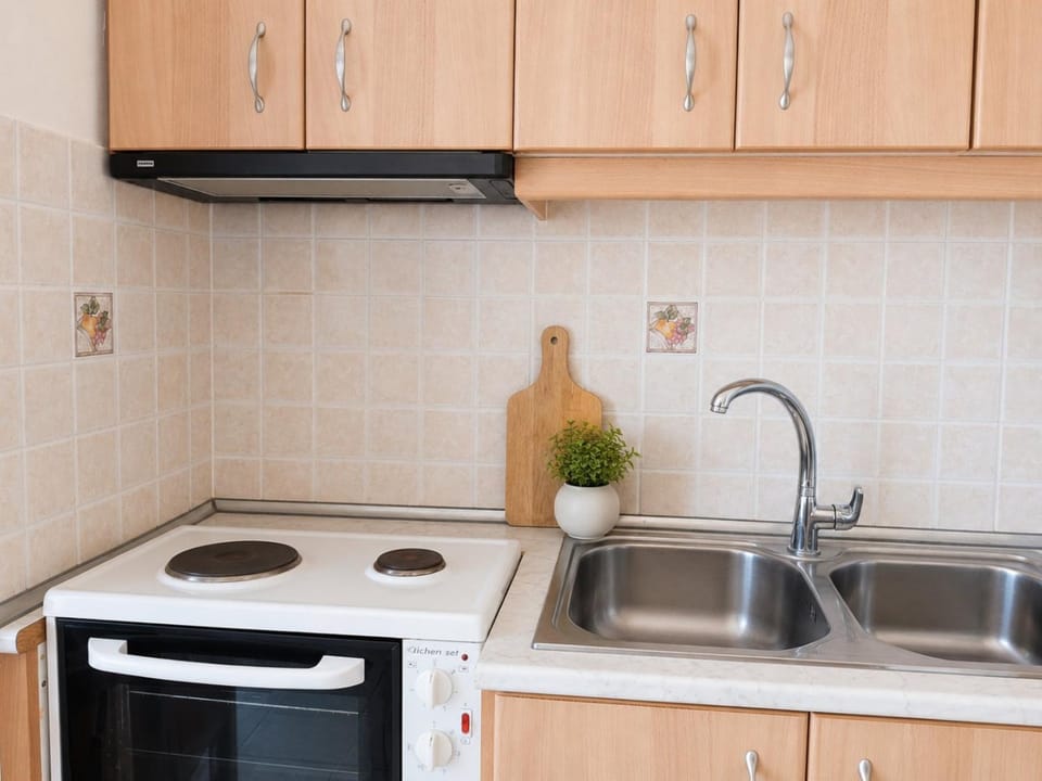 Kitchen or kitchenette, stove