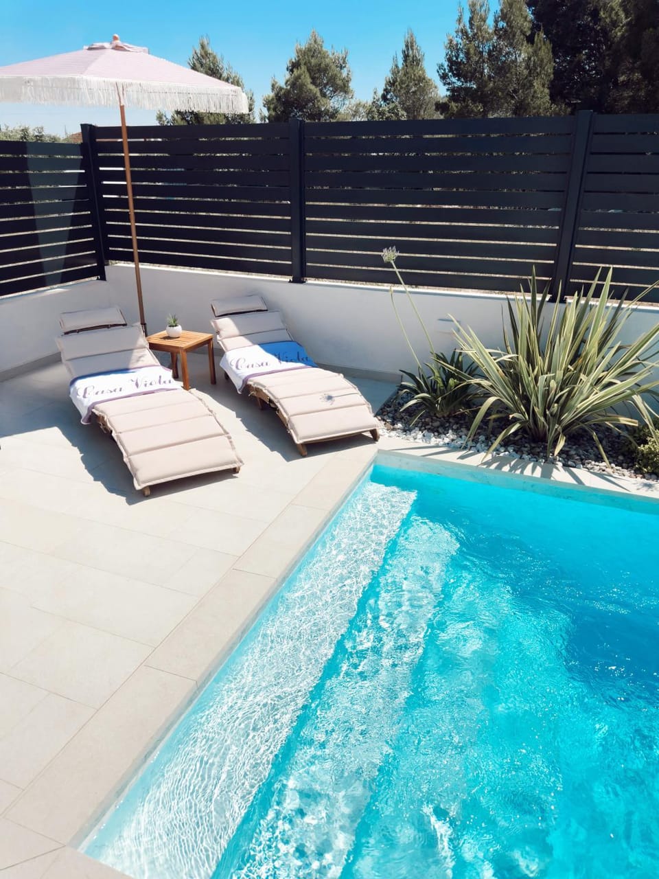 Patio, Day, Natural landscape, Pool view, Swimming pool, sunbed