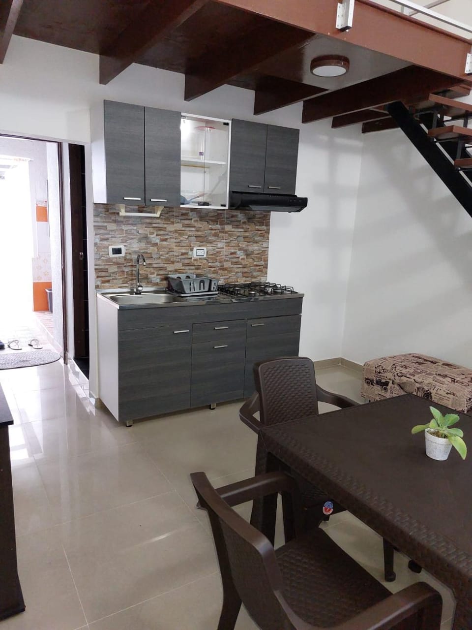 Kitchen or kitchenette, Living room, Seating area, Dining area