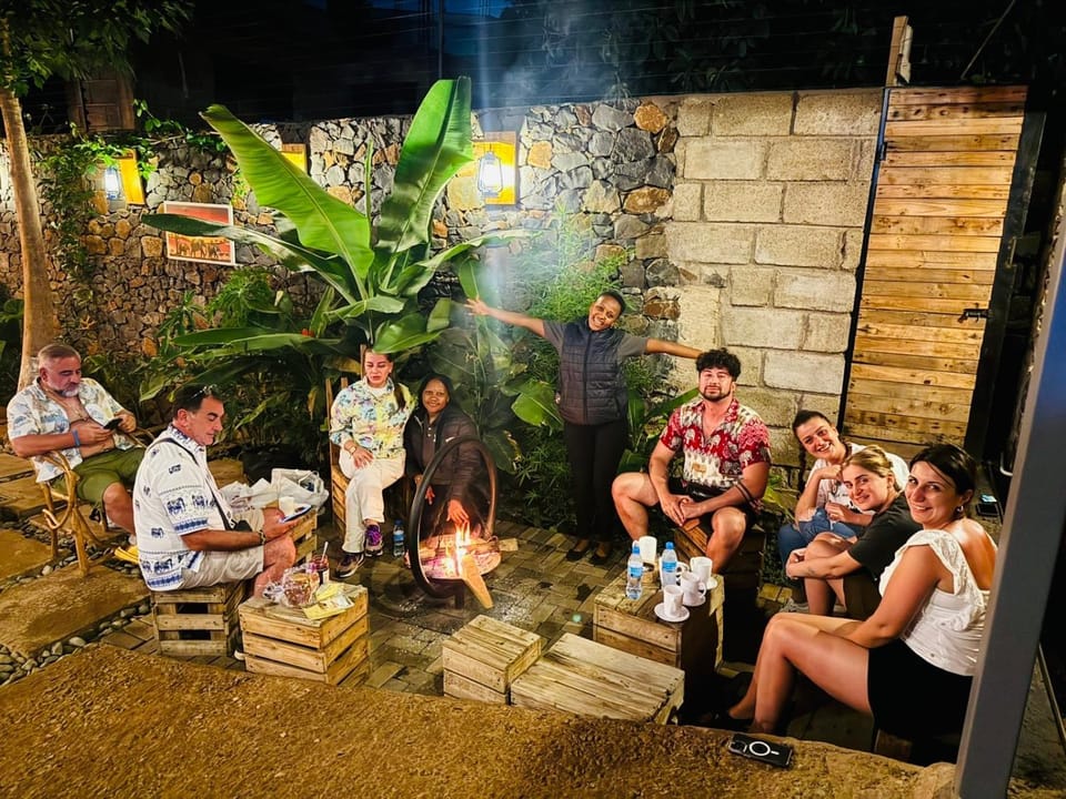 Patio, Night, People, group of guests, fireplace