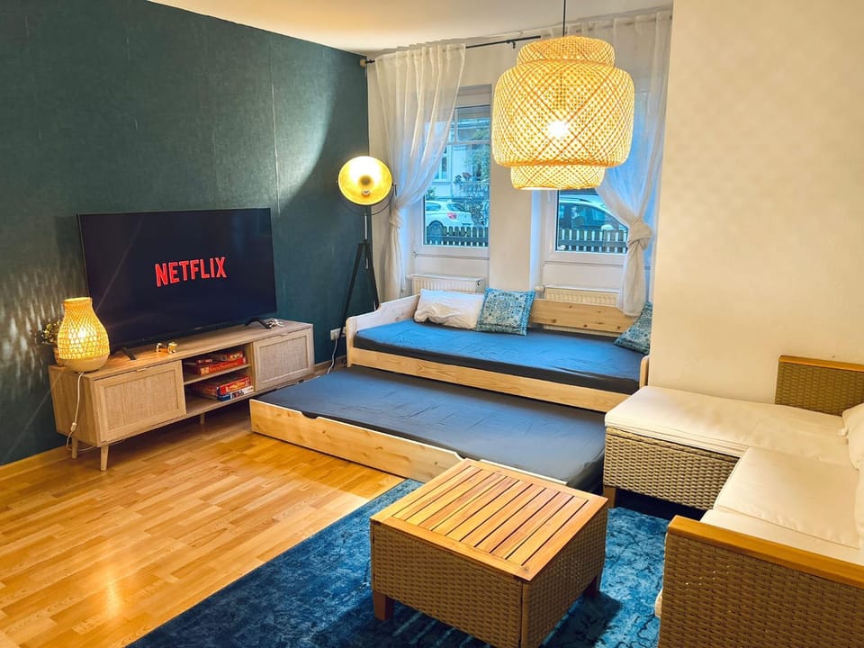 Bed, TV and multimedia, Living room, Seating area