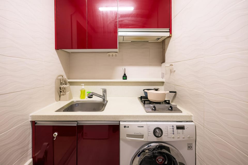 Kitchen or kitchenette, washing machine