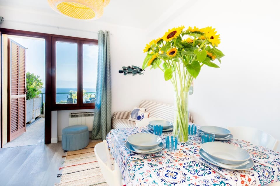 Natural landscape, Living room, Seating area, Dining area, Sea view