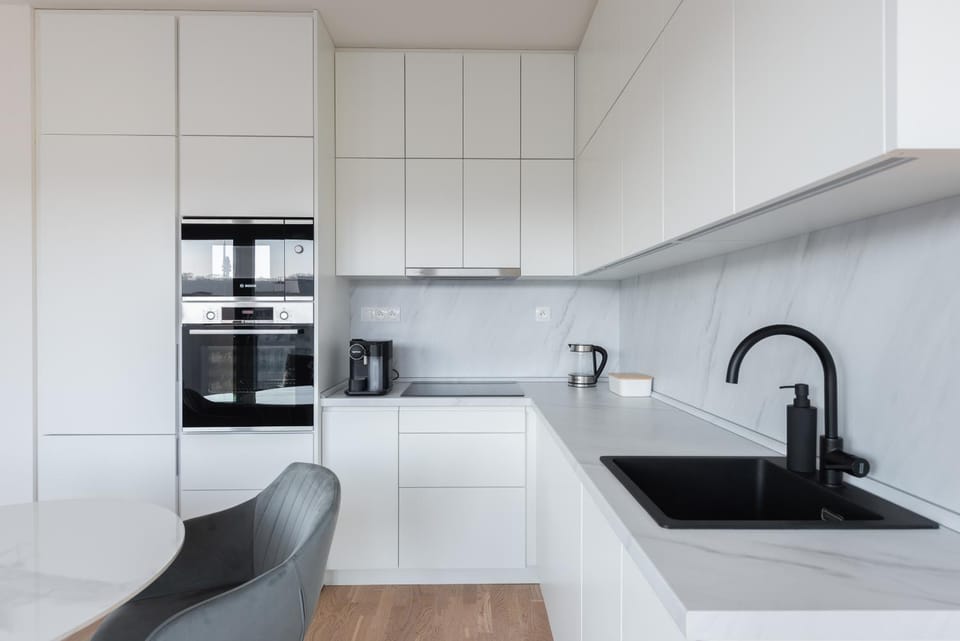Kitchen or kitchenette, dishwasher, microwave, oven, stove, kitchen
