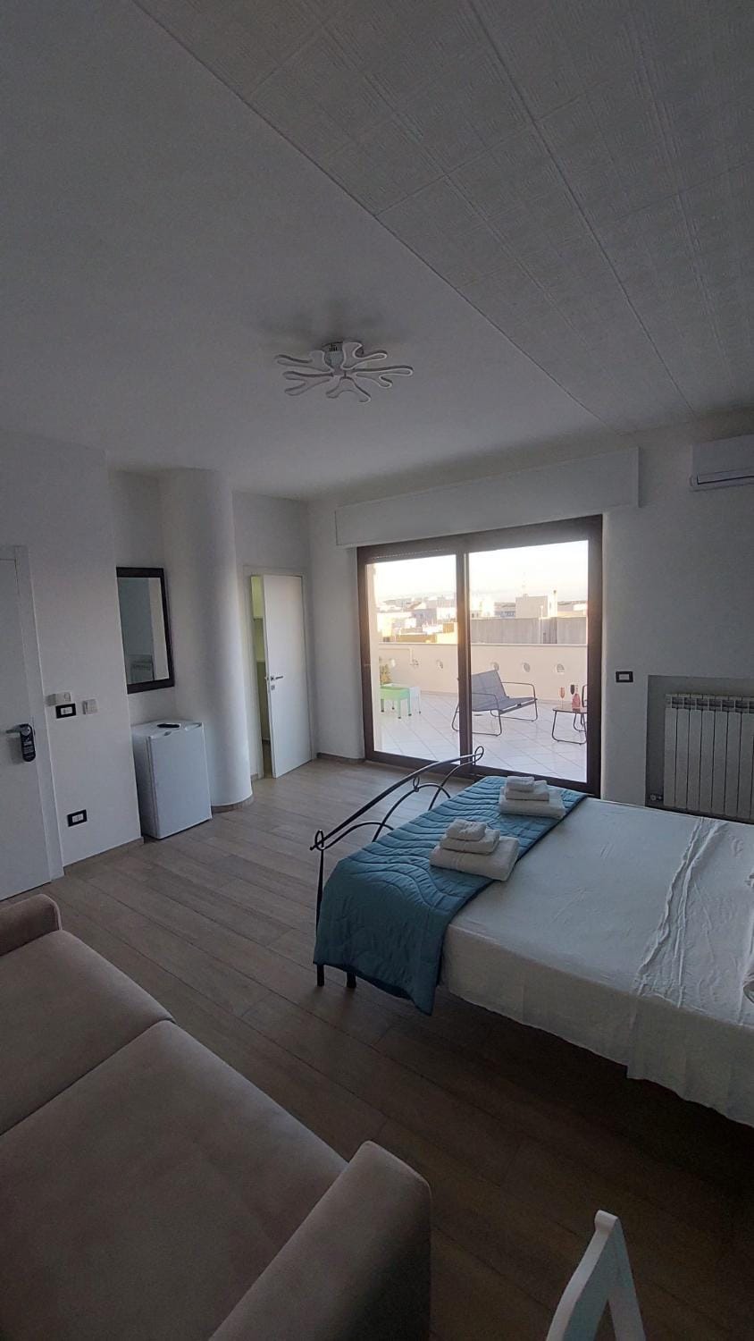 Bed, Photo of the whole room, Bedroom, towels, air conditioner