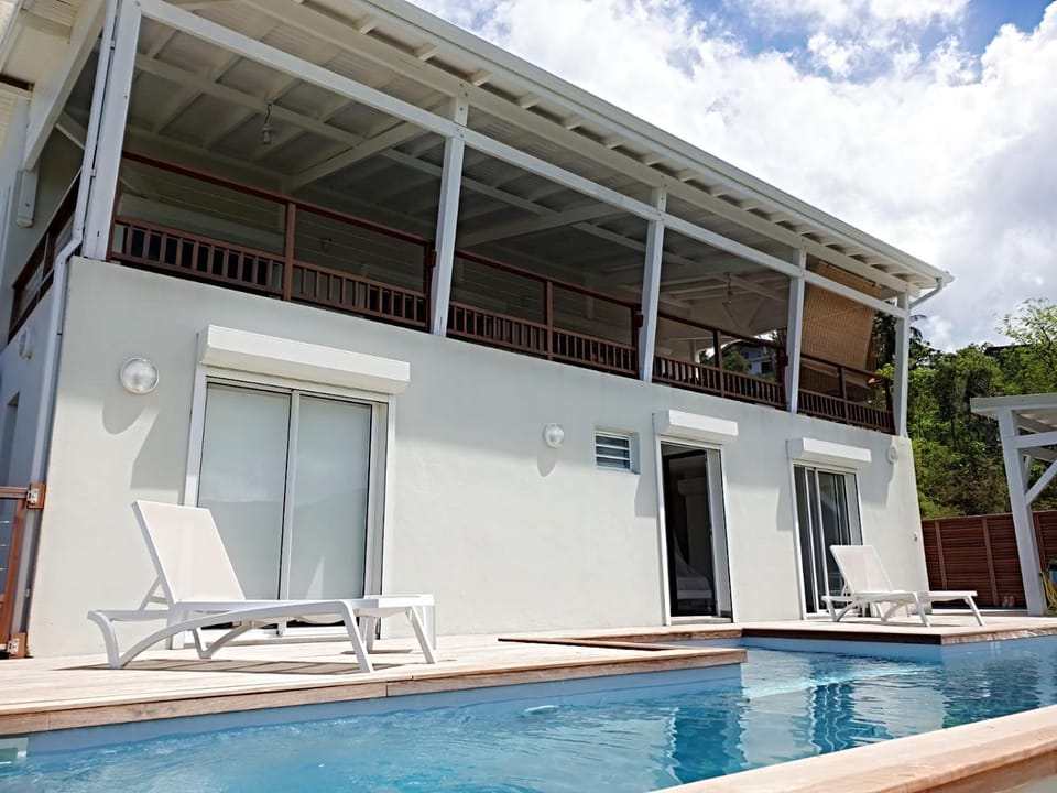 Property building, Patio, Pool view, sunbed