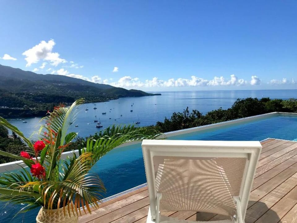 View (from property/room), Balcony/Terrace, Mountain view, Pool view, Sea view, Swimming pool, sunbed