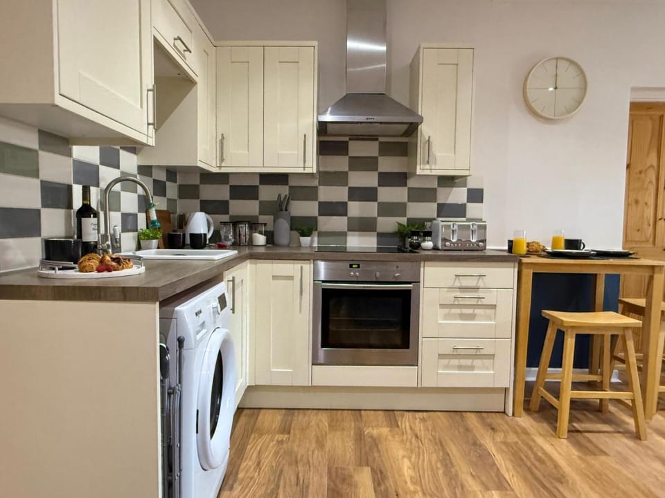 Kitchen or kitchenette, oven, stove, toaster