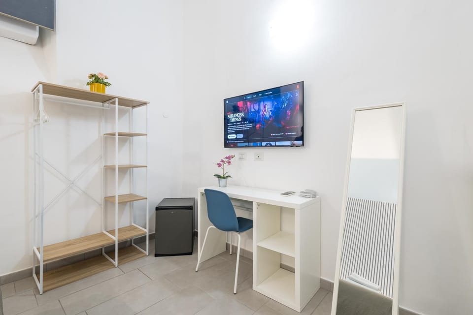 Photo of the whole room, Bedroom, minibar, wardrobe, air conditioner