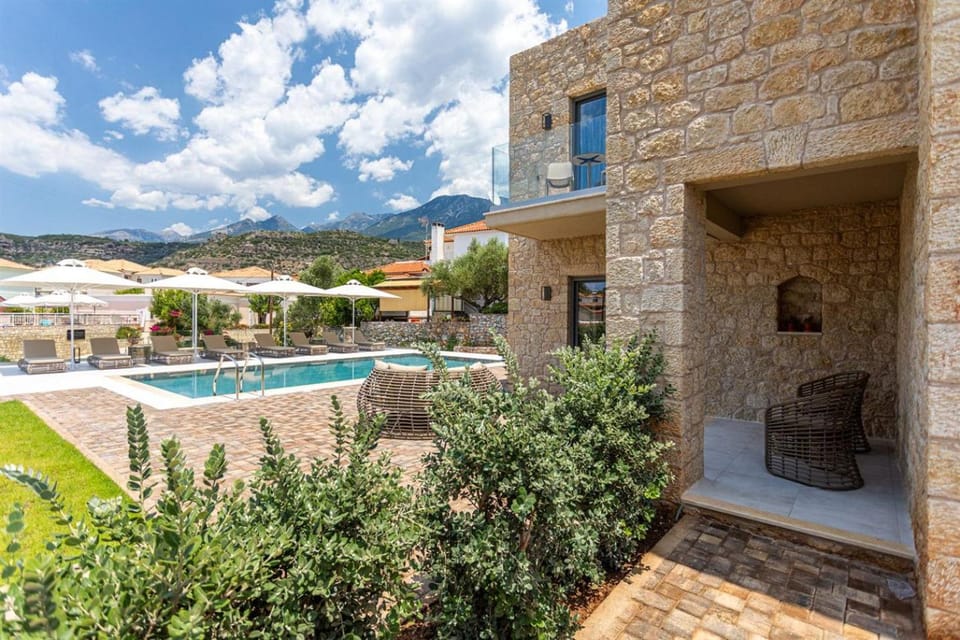 Property building, Patio, Day, Garden, View (from property/room), Balcony/Terrace, Garden view, Mountain view, Pool view, sunbed