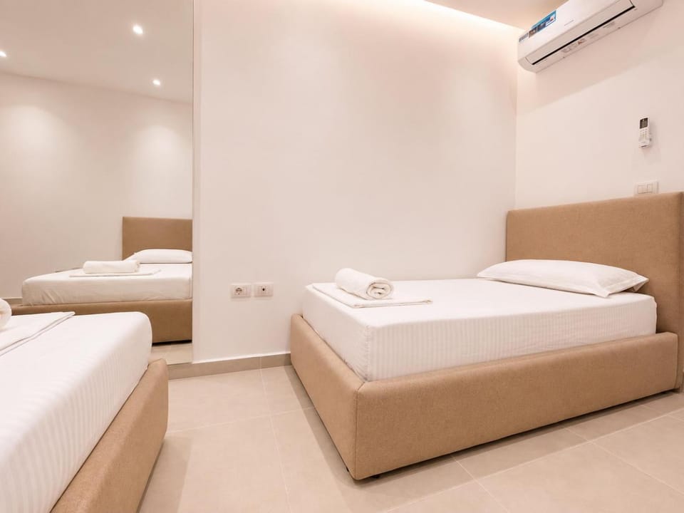 Bed, Photo of the whole room, Bedroom, towels, air conditioner