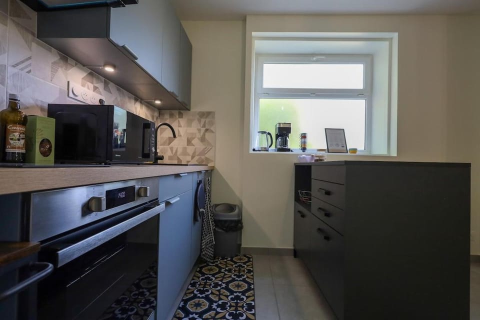 Kitchen or kitchenette, oven, stove, toaster
