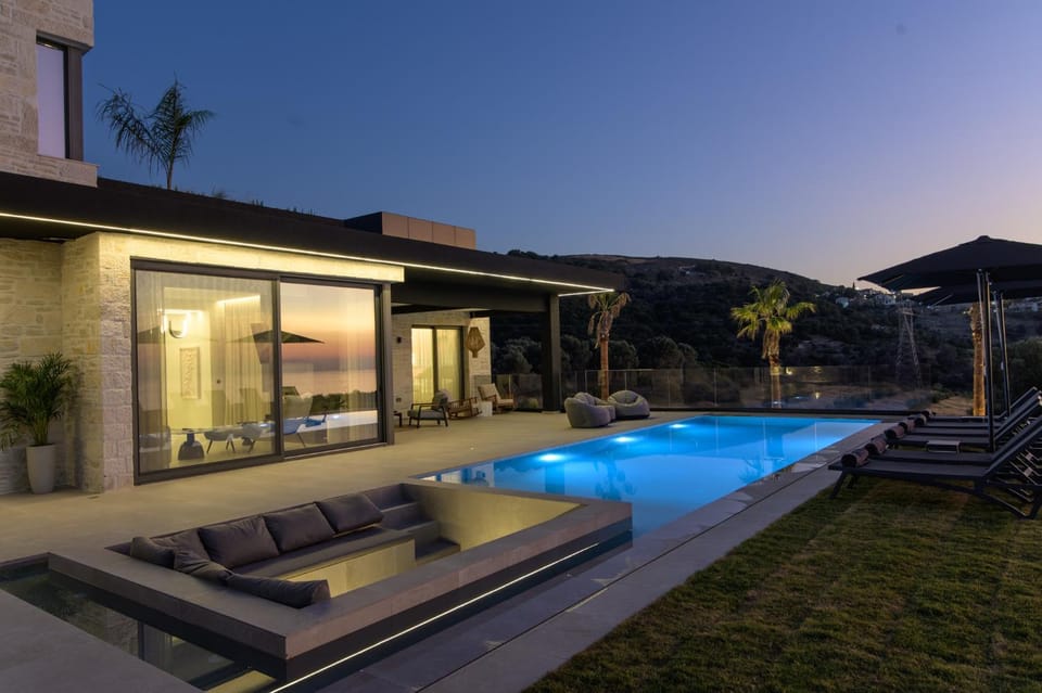 Property building, Patio, Night, Natural landscape, Pool view, Swimming pool, sunbed