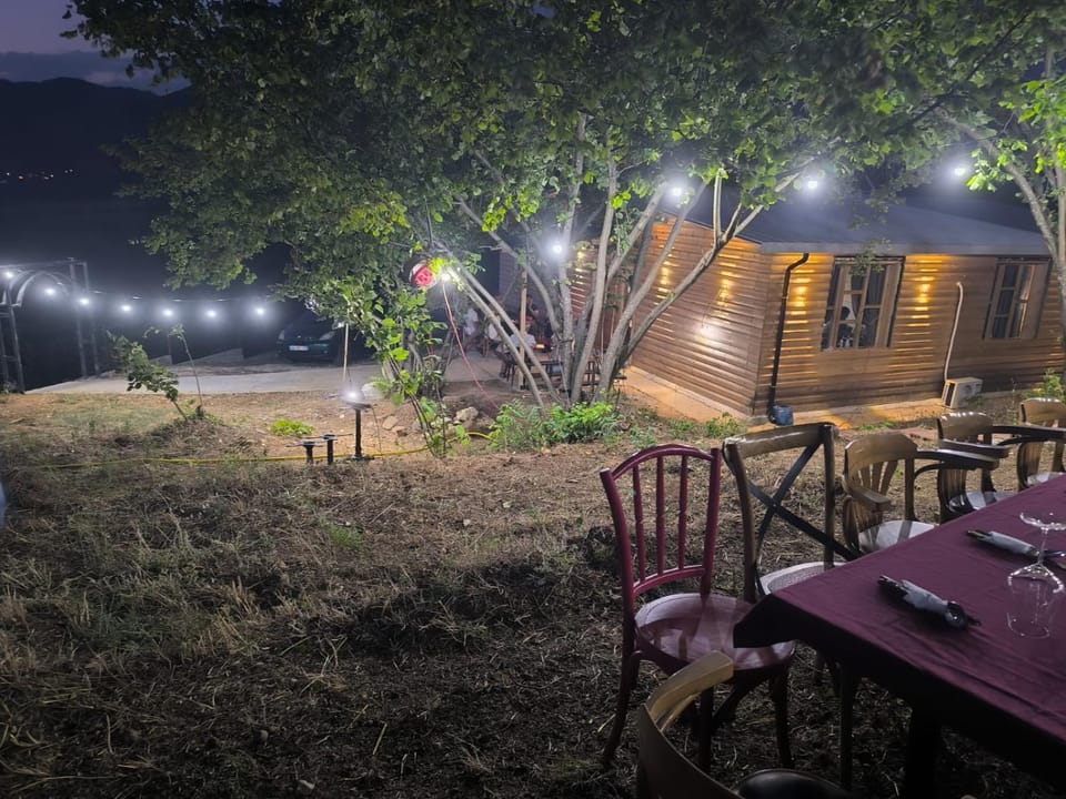 Property building, Patio, Night, Natural landscape, Garden, Dining area, Garden view