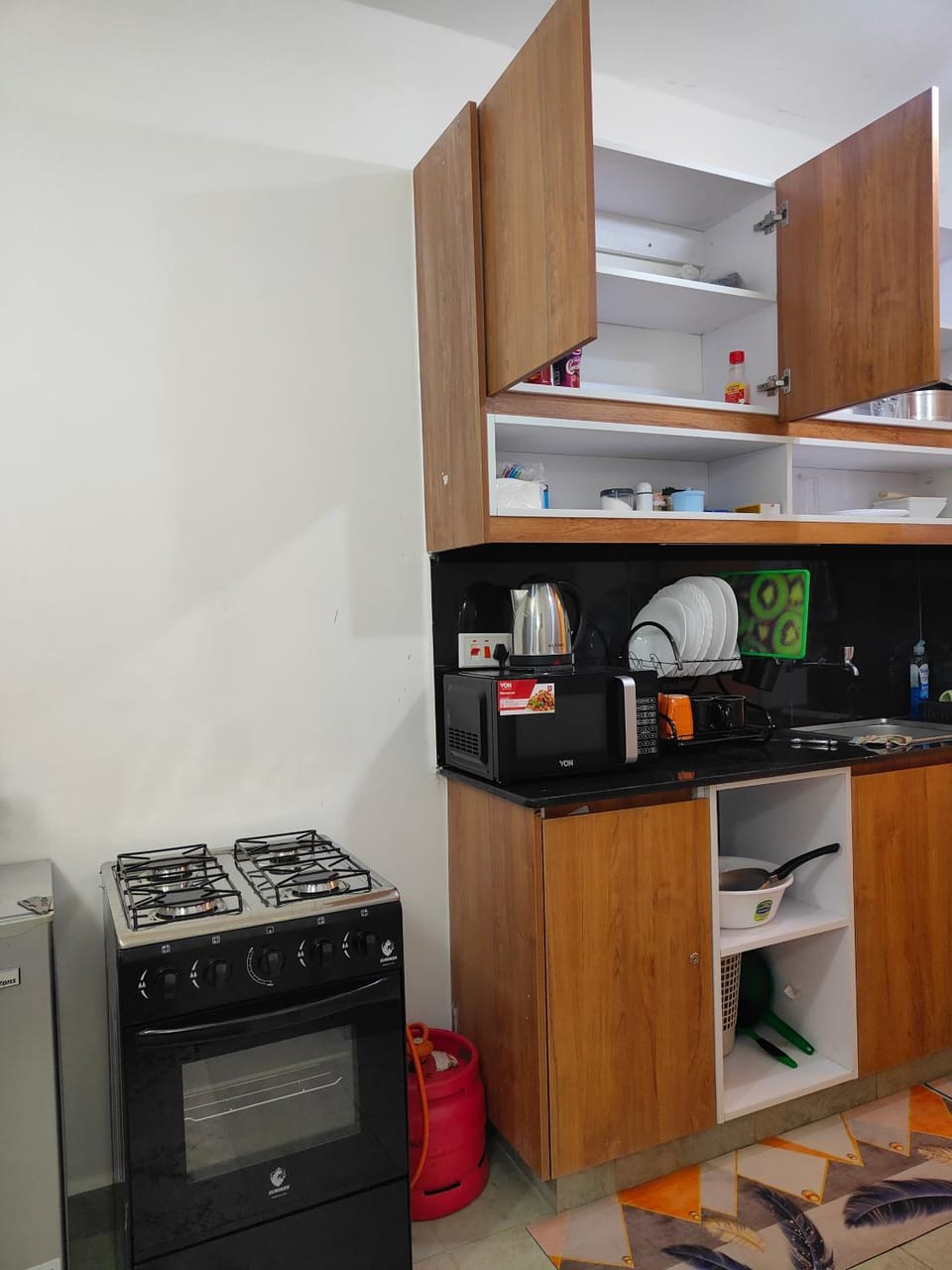 Kitchen or kitchenette, oven, stove