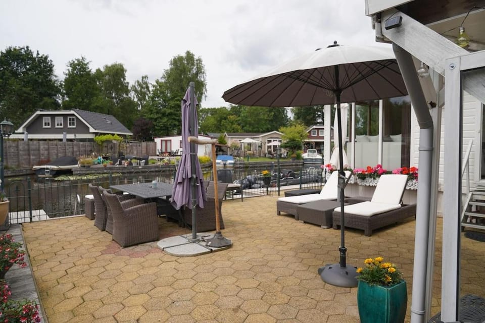 Chalet with waterfront sauna and boat Chalet in North Holland (province)