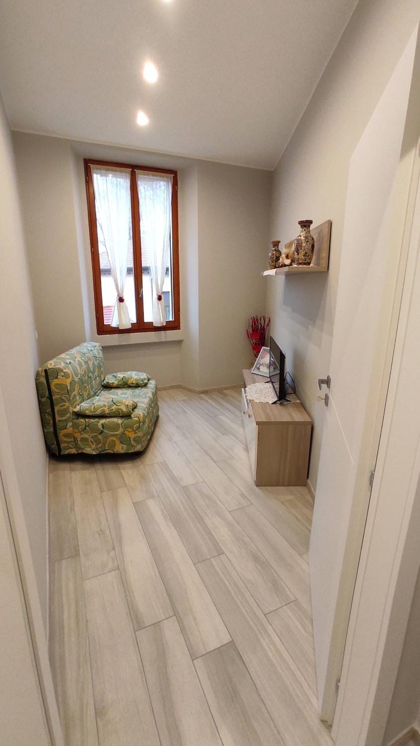 Bed, Living room, Seating area