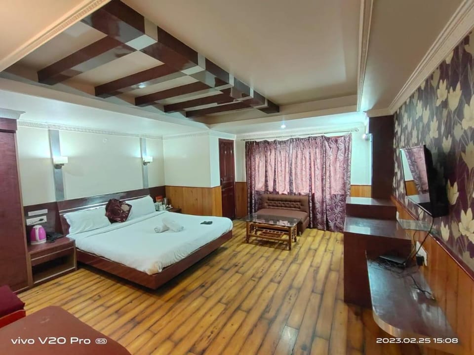 Bed, Living room, Seating area, Bedroom
