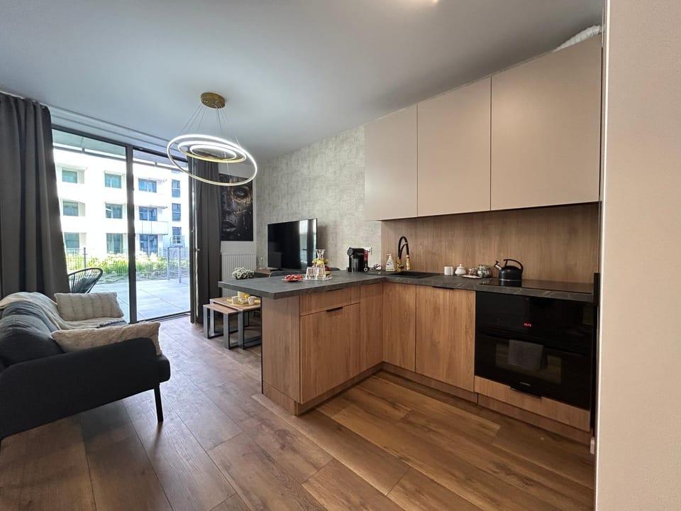 Coffee/tea facilities, Kitchen or kitchenette, Living room, Seating area, Dining area, stove