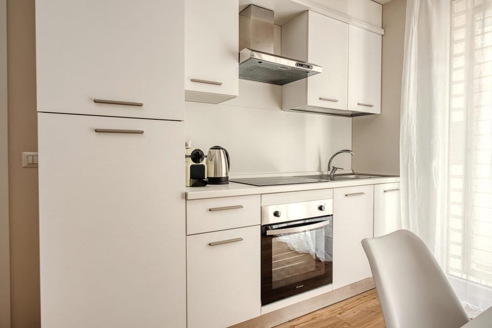 Kitchen or kitchenette, stove