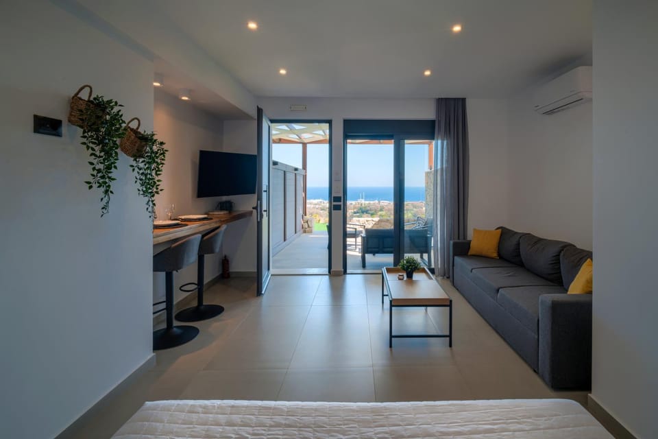 View (from property/room), Seating area, Bedroom, Sea view