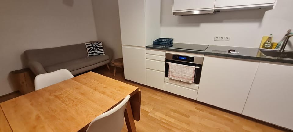 Kitchen or kitchenette, Living room, Seating area, stove