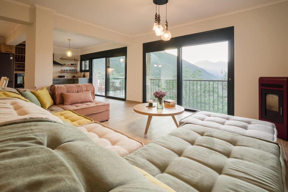 Natural landscape, View (from property/room), Living room, Seating area, Mountain view