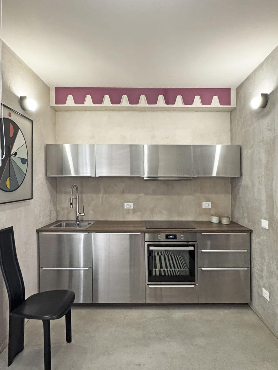 Kitchen or kitchenette, dishwasher, oven, stove