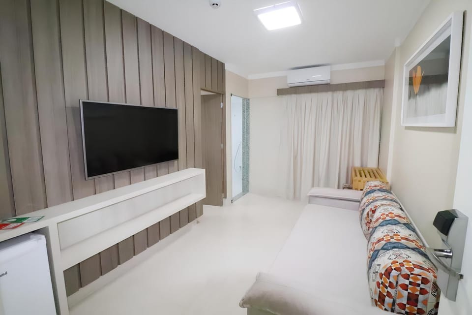Communal lounge/ TV room, Bed, TV and multimedia, Living room, Photo of the whole room, Seating area, Evening entertainment, Bedroom, air conditioner