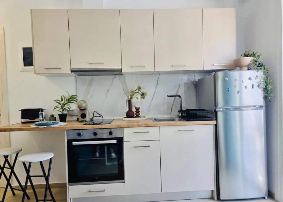 Kitchen or kitchenette, oven, stove, toaster