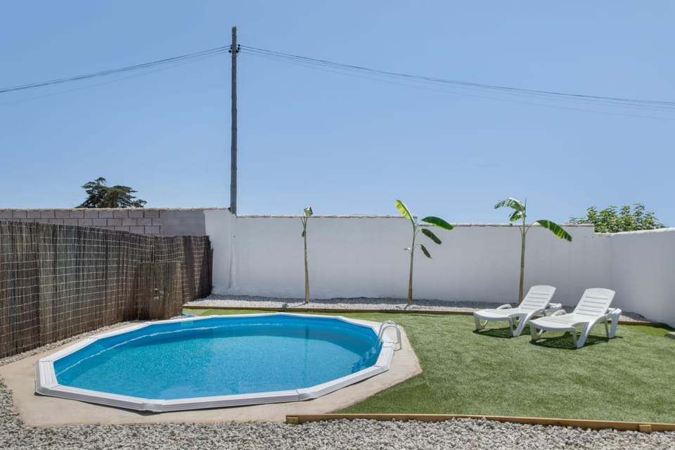 Property building, Living room, Swimming pool