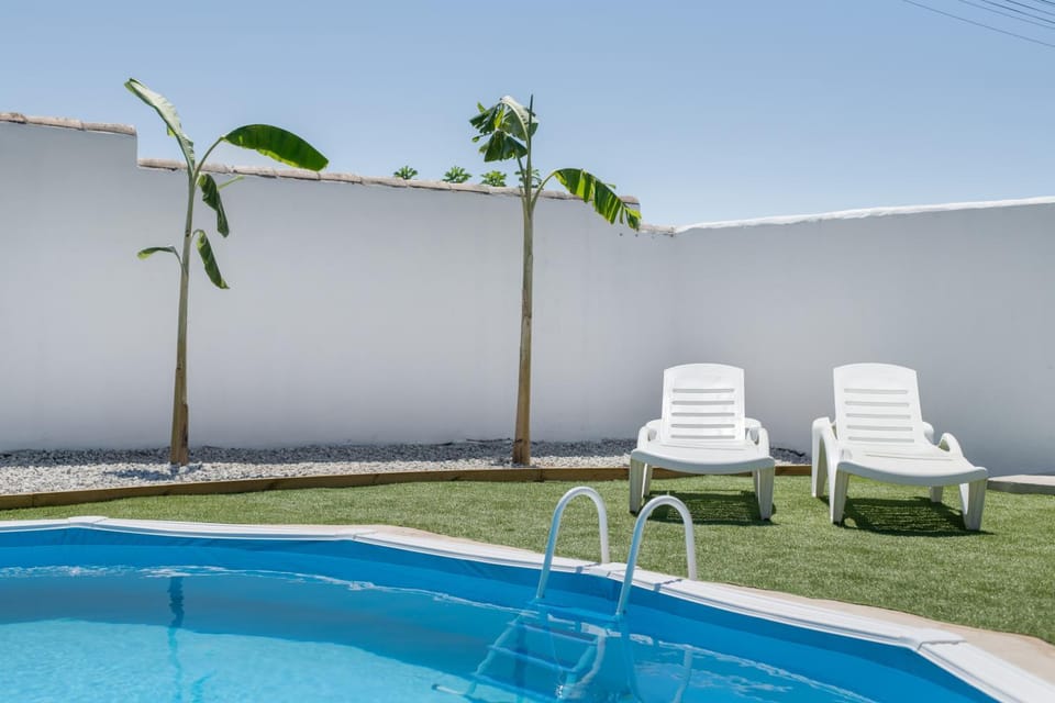 Property building, Living room, Swimming pool