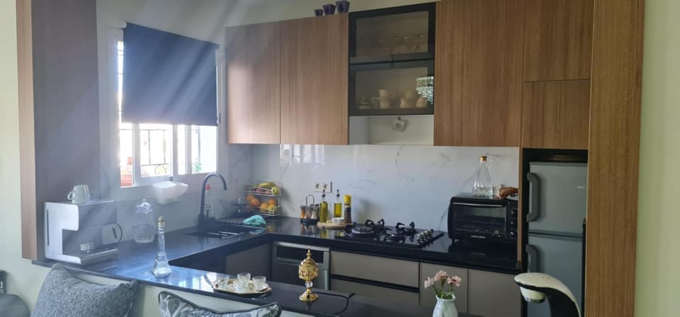 Kitchen or kitchenette, stove