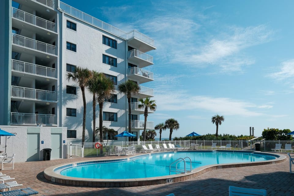 Renovated direct oceanfront corner condo with a huge wrap-around balcony and pool House in Florida