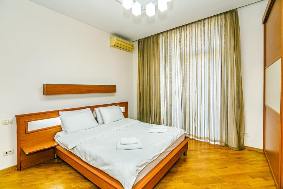 Bed, Bedroom, towels, air conditioner