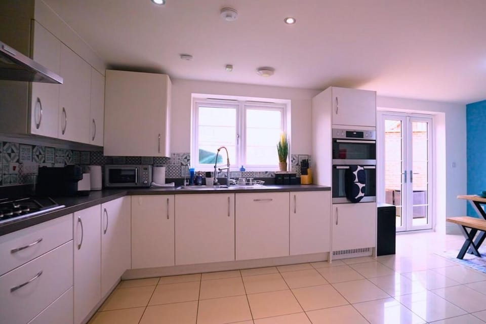 Kitchen or kitchenette, stove, toaster